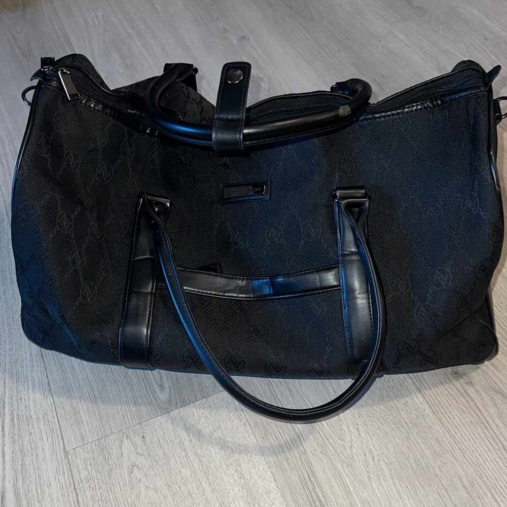 Adrienne Vittadini Black Textured Fabric Travel bag.